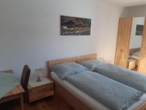Postel nebo postele na pokoji v ubytování Ferienwohnung Widmann