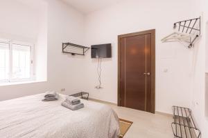 Postel nebo postele na pokoji v ubytování La casita de AO