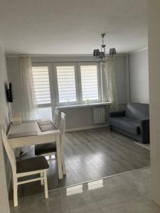 Posedenie v ubytovaní Apartamenty Marii Konopnickiej