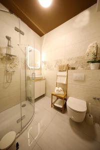 Koupelna v ubytování Residence Antiqua Rooms + 35 fotografií