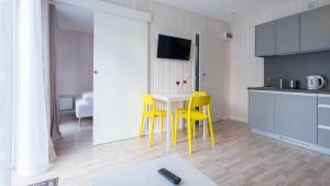 Kuchyň nebo kuchyňský kout v ubytování MEDUSA apartamenty i bungalowy