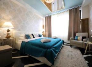 A bed or beds in a room at Residence Antiqua Rooms