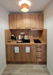 Kuchyňa alebo kuchynka v ubytovaní Apartmán FILIP