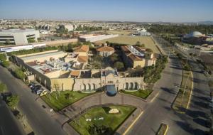 an aerial view of a building in a city at Quinta Real Aguascalientes in Aguascalientes