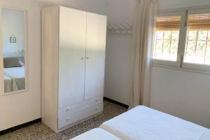 Posteľ alebo postele v izbe v ubytovaní Casa rural Can Pep de Sa Barda - Entre viñedos - Formentera Natural
