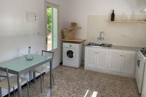 Kuchyňa alebo kuchynka v ubytovaní Casa rural Can Pep de Sa Barda - Entre viñedos - Formentera Natural
