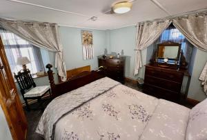 Voodi või voodid majutusasutuse Nore View House toas