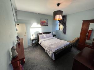 Voodi või voodid majutusasutuse Nore View House toas