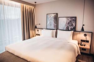 Radisson Resort Kołobrzeg客房内的一张或多张床位