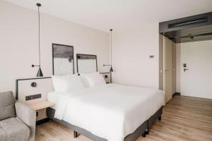 Radisson Resort Kołobrzeg客房内的一张或多张床位