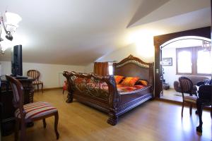 Postel nebo postele na pokoji v ubytování Hotel El Juglar