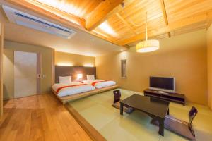 Letto o letti in una camera di Toushinan Komeya