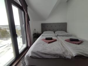 Postel nebo postele na pokoji v ubytování Diamond Sunrise