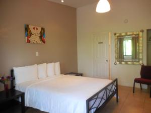 Postel nebo postele na pokoji v ubytování Shalimar Motel + 34 fotografií
