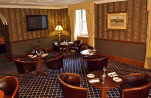 Un restaurante u otro lugar para comer en Shap Wells Hotel