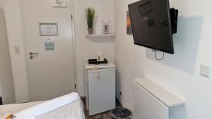 Fotografie z fotogalerie ubytování Pension Likedeeler Doppelzimmer William Kidd v destinaci Borkum