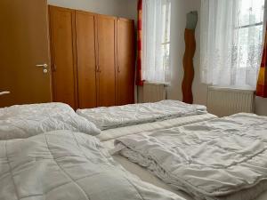 Postel nebo postele na pokoji v ubytování Apartmán Riviera J1/1