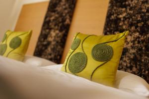 Letto o letti in una camera di Hotel Garni Toscanina - Adults Only