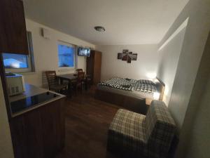 Posteľ alebo postele v izbe v ubytovaní Apartmánový dom Stela