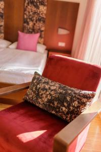 Letto o letti in una camera di Hotel Garni Toscanina - Adults Only
