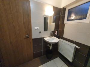 Kúpeľňa v ubytovaní Apartmánový dom Stela