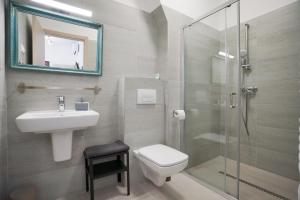 Kúpeľňa v ubytovaní Koffer Apartman