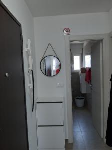 Ванна кімната в Gita Apartmani