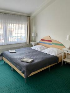 Posteľ alebo postele v izbe v ubytovaní Yacht Club Residence Sopot