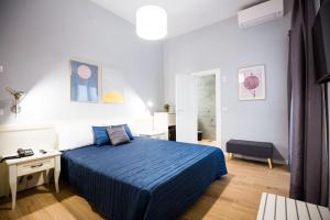 Кровать или кровати в номере Hotel Conchiglia