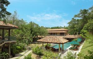 an image of a resort with a swimming pool at Green Escape Unawatuna in Unawatuna