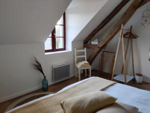 Кровать или кровати в номере Chambres d'hôtes / B&B Chez Mon Rêve