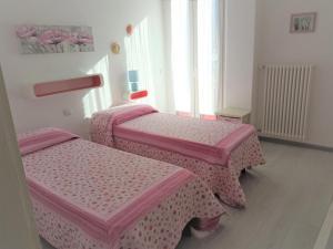 Postel nebo postele na pokoji v ubytování Garden Belvedere B&B