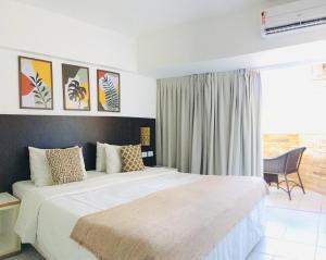 Katil atau katil-katil dalam bilik di Pipas Bay - Aparthotel Beira Mar