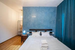 Postel nebo postele na pokoji v ubytování casa akacia