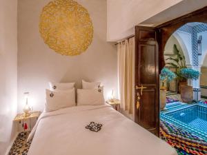 Voodi või voodid majutusasutuse Riad Art & Emotions Boutique Hotel & Spa toas