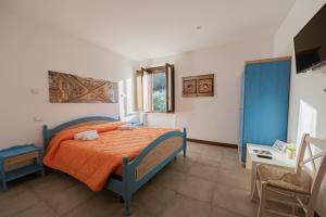 Llit o llits en una habitació de Locanda Orvieto Agriturismo