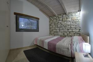 Posteľ alebo postele v izbe v ubytovaní Kalpaki luxury maisonette 3