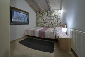Posteľ alebo postele v izbe v ubytovaní Kalpaki luxury maisonette 3