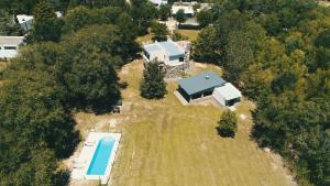 an aerial view of a house with a swimming pool at Casa de Piedra in Nono