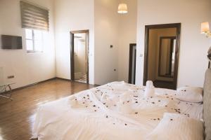 A bed or beds in a room at Thrace Konak Hotel & SPA
