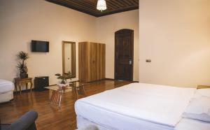 A bed or beds in a room at Thrace Konak Hotel & SPA