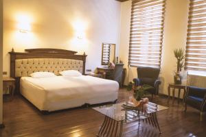 A bed or beds in a room at Thrace Konak Hotel & SPA