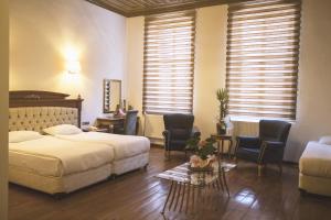 A bed or beds in a room at Thrace Konak Hotel & SPA