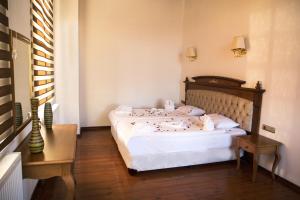 A bed or beds in a room at Thrace Konak Hotel & SPA