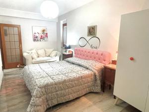 Katil atau katil-katil dalam bilik di La Vie en Rose Mattinata