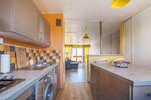 Η κουζίνα ή μικρή κουζίνα στο Appartement spacieux équipé avec WIFI