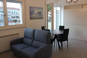 A seating area at Appartamento Torre Matilde