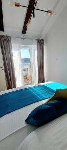 Postel nebo postele na pokoji v ubytování Guest House Galeb2