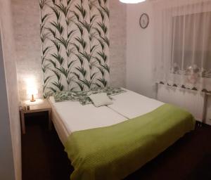Posteľ alebo postele v izbe v ubytovaní Noclegi Malta Poznań