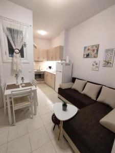 A kitchen or kitchenette at Gioiello di Corfu apartment